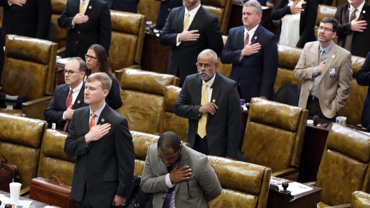 Mississippi House members recite the Pledge of Allegiance on Jan. 3, the first day of the legislative session in Jackson.