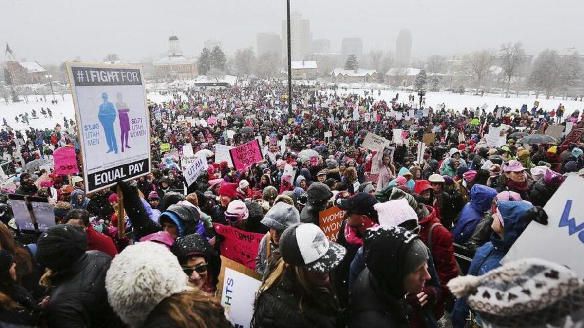Thousands of people attend a women’s march on the Capitol in Salt Lake City on Monday.