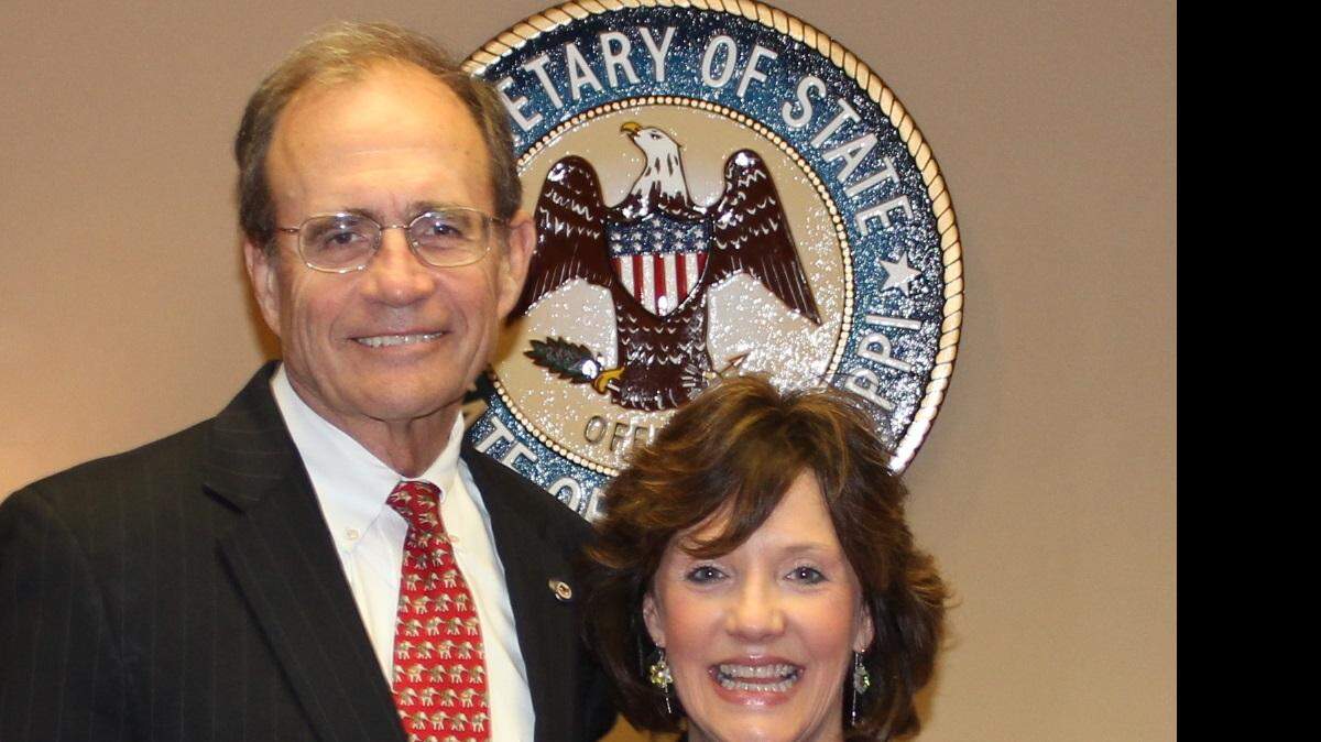 Secretary of State Delbert Hosemann and Assistant Secretary of State for External Marketing Sherri Carr Bevis.
