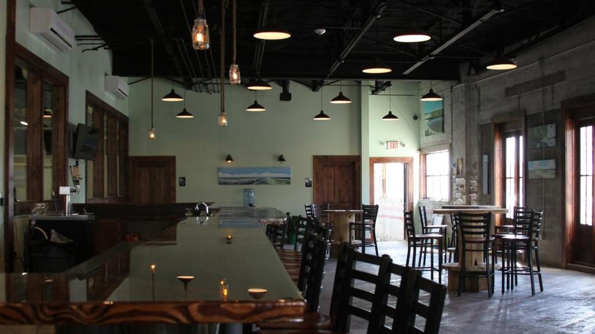 The tasting room at Chandeleur Brewing Co. in Gulfport takes up a corner of the 8,000-square-foot brewery. As of July 1, patrons can buy beer directly from the distillers at their site.