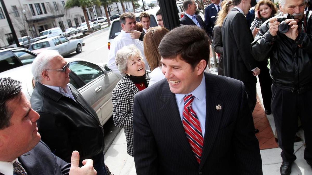 Congressman Steven Palazzo visits with constituents before the 2011 grand opening ceremony of his new district office in downtown Gulfport. Some Coast constituents say connecting with the congressman is nearly impossible.
