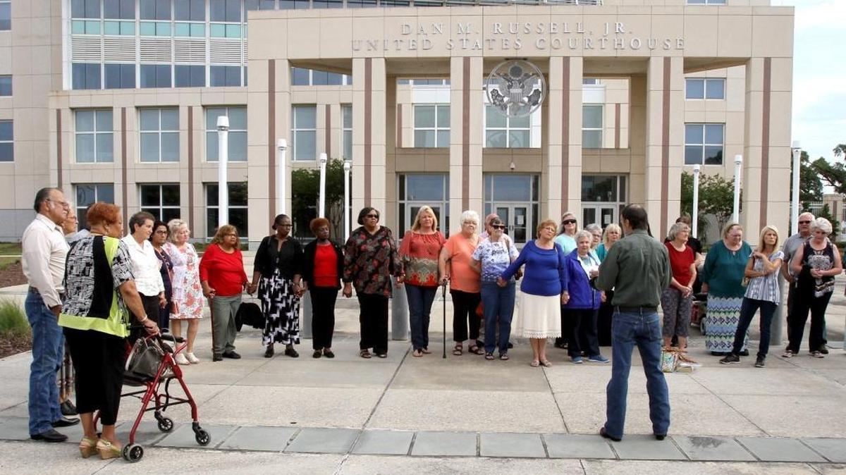 Retirees opposed to a settlement with Singing River Health System over its failed pension prepare for a hearing in U.S. District Court in May 2016. The U.S. Supreme Court on Monday, March 18, 2019, denied their appeal.