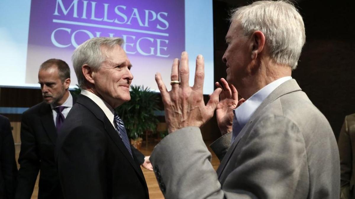 Former Secretary of the Navy and former Mississippi Gov. Ray Mabus, second from left, is greeted by friends at Millsaps College in Jackson, Miss., Friday, Feb. 17, 2017. Mabus released a statement Thursday explaining why he won’t attend the Mississippi Civil Rights Museum opening on Saturday.