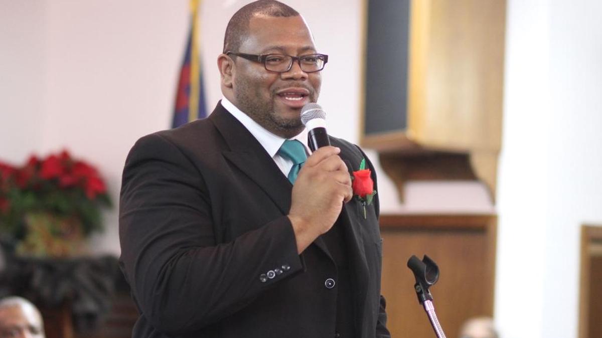 Marcus Mann, pastor of First Baptist Church in Carthage, Miss., speaks to the congregation. Twenty years ago, on the eve of the season, Mann told the Golden State Warriors his heart wasn't in basketball.
