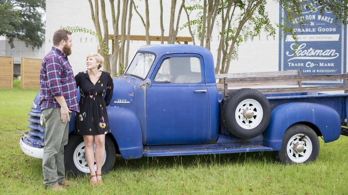 Erin and Ben Napier, the stars of HGTV's "Home Town," outside their business, Laurel Merchantile Co., in Laurel, Mississippi. The couple and their town are rising stars of the cable giant focused on house makeovers.
