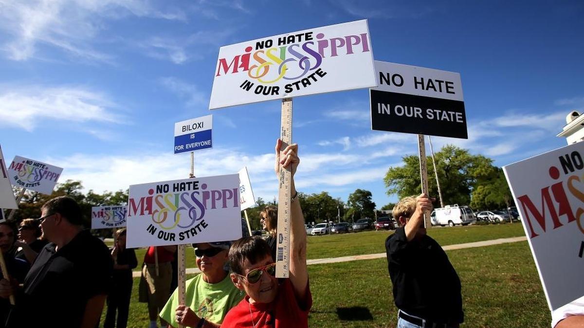Mississippians gather outside of the Biloxi Visitor's Center in 2016 to protest HB 1523.