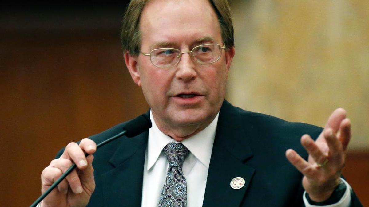 House Education Committee Chairman John Moore, R-Brandon, discusses a pair of education bills during floor debate in House Chambers at the Capitol in Jackson, Miss., Thursday, Jan. 22, 2015.