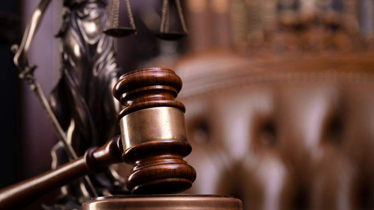 A pizza franchise operator is accused of retaliating against two workers who spoke to federal investigators about labor practices in Colorado, officials said.