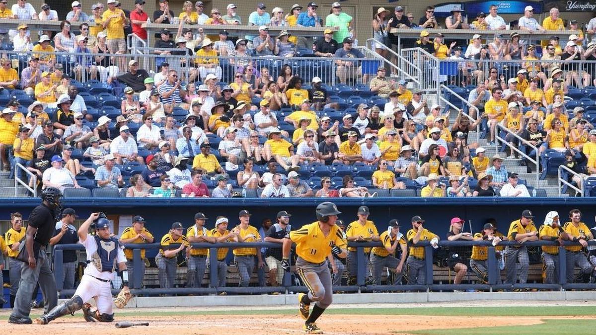 Southern Mississippi Mason Irby hits a single against Rice during the seventh inning of the C-USA tournament championship game at MGM Park in Biloxi on Sunday. The game set a new C-USA attendance record.