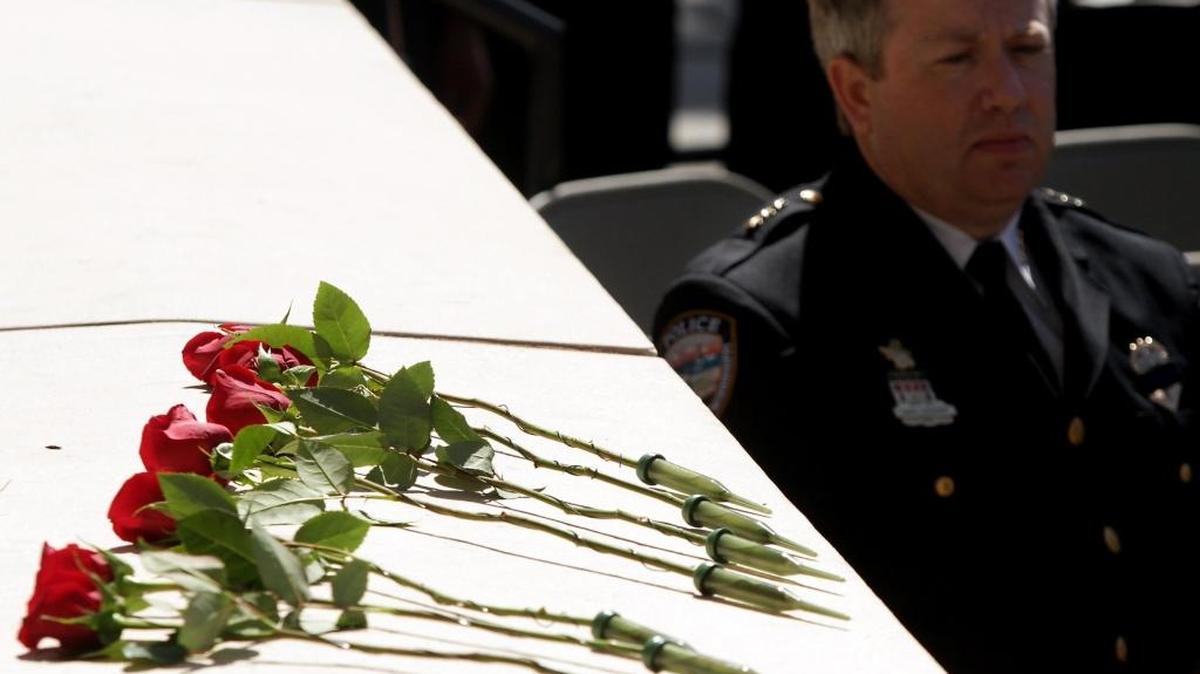 Members of the Gulfport Police Department in 2014 remember their fellow officers who have fallen in the line of duty by placing eight roses, one for each officer, at a granite memorial marker. A similar ceremony is planned for Friday.