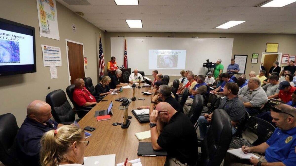 Emergency Management Crew members meet in Harrison County on Hurricane Nate, which made landfall in South Mississippi early Sunday. Emergency management leaders in Jackson, Hancock and other counties also worked to keep everyone safe on the Coast.