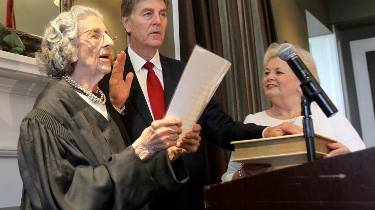 Clare Sekul Hornsby swears in Andrew "FoFo" Gilich as mayor of Biloxi, Monday, May 18, 2015.