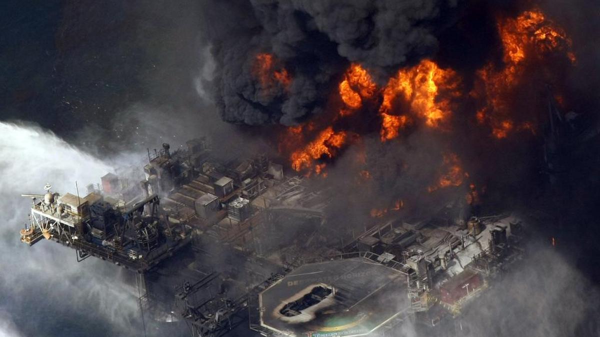 In this April 21, 2010, file photo, the Deepwater Horizon oil rig burns in the Gulf of Mexico, more than 50 miles southeast of Venice, La. As part of the oil spill settlement, Mississippi would receive about $1.5 billion over 17 years, Republican Gov. Phil Bryant and Democratic Attorney General Jim Hood said Thursday. Added to $659 million in earlier funding, Mississippi would receive a total of about $2.2 billion, if the settlement is approved by a court.