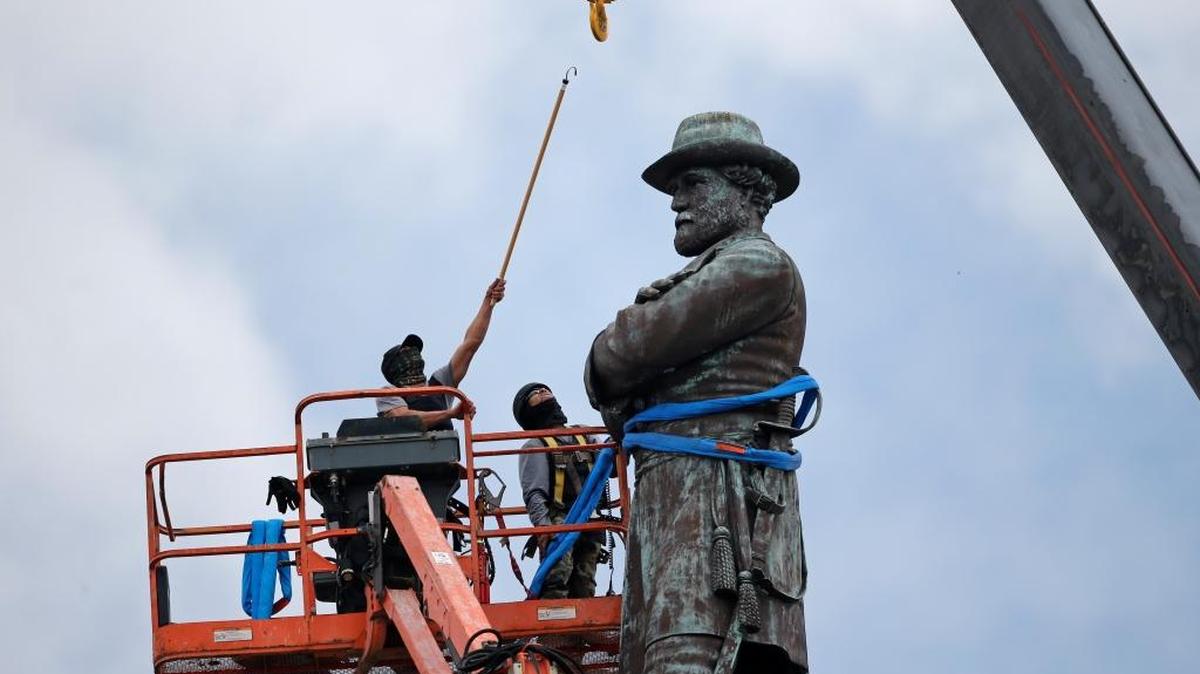 Workers prepare to take down the statue of former Confederate general Robert E. Lee on May 19, which stands over 100 feet tall, in Lee Circle in New Orleans. Mississippi Rep. Karl Oliver of Winona apologized on Monday, May 22, for saying Louisiana leaders should be lynched for removing Confederate monuments, only after his comment sparked broad condemnation in both states. The post was made after three Confederate monuments and a monument to white supremacy were removed in New Orleans.
