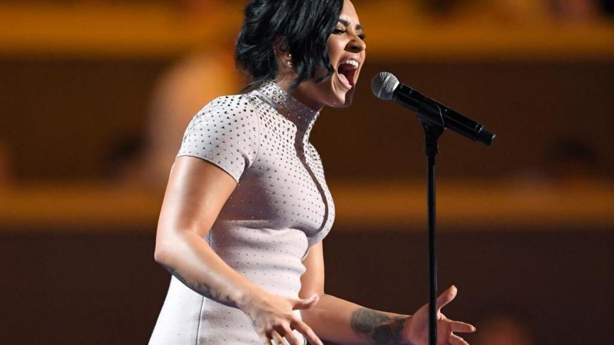 Singer Demi Lovato performs during the first day of the Democratic National Convention in Philadelphia on Monday.