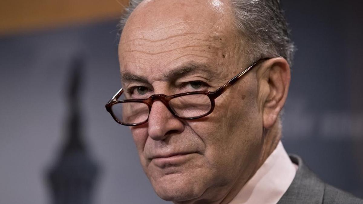 Senate Minority Leader Chuck Schumer of N.Y., pauses as he joins fellow Democrats during a news conference on Capitol Hill in Washington, Friday, Feb. 17, 2017. to announce their request of the Republican majority to delay the confirmation vote on President Donald Trump's controversial nominee to lead the Environmental Protection Agency, Scott Pruitt.