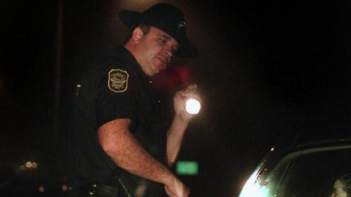Gulfport Police DUI Officer T.J. Hicks questions a driver to see if they are impaired by alcohol during a traffic stop on U.S. 90 near Hewes Avenue. A Sound Off says law enforcement should enforce the laws on the books, like speeding and DUI.