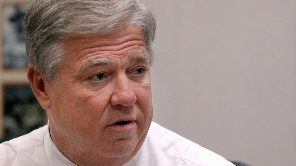 Former Mississippi Governor Haley Barbour was detained at the Jackson airport because he had a loaded handgun in his briefcase when he was going through security.