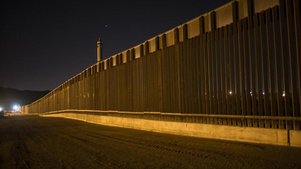 This March 30, 2017 file photo shows a portion of the new steel border fence that stretches along the US-Mexico border in Sunland Park, New Mexico. The Trump administration has proposed spending $18 billion over 10 years to significantly extend the border wall with Mexico.