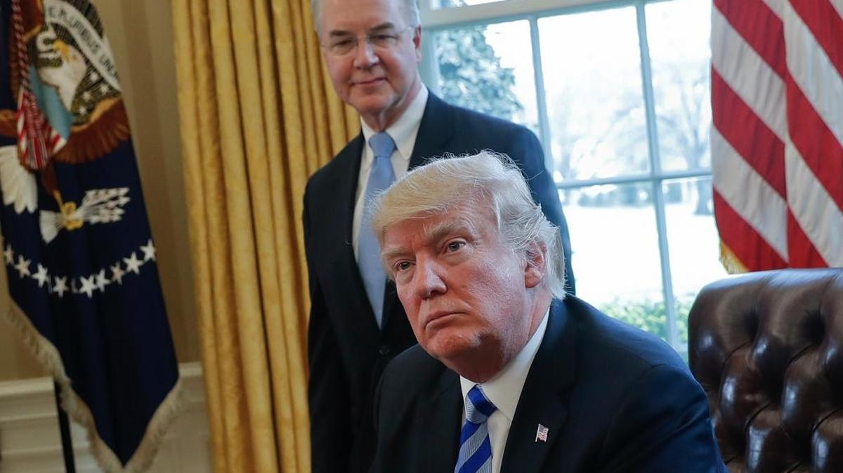 FILE - In this March 24, 2017 file photo, President Donald Trump with Health and Human Services Secretary Tom Price are seen in the Oval Office of the White House in Washington. For Republicans, health care is becoming a big political gamble. Not only are they trying to scale back major benefit programs being used by millions of people, but they’re doing so even as the public is leery of drastic changes, and there’s no support outside their own party.