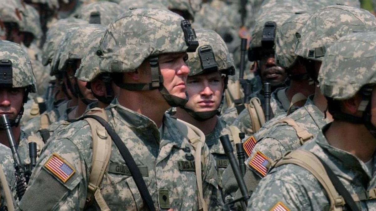 Soldiers of the "Iron Brigade" pass in review at Camp Shelby parade field. Approximately 4,000 men of the 2/28th Brigade Combat Team of the Pennsylvania Army National Guard were given their send off by dignitaries and family. The 2/28th has men from 36 states which are heading to Iraq.