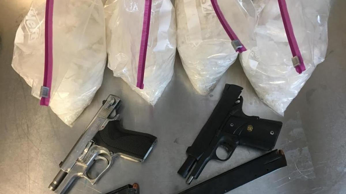 Eight pounds of meth and two firearms were recovered from a traffic stop in Hancock County Tuesday.