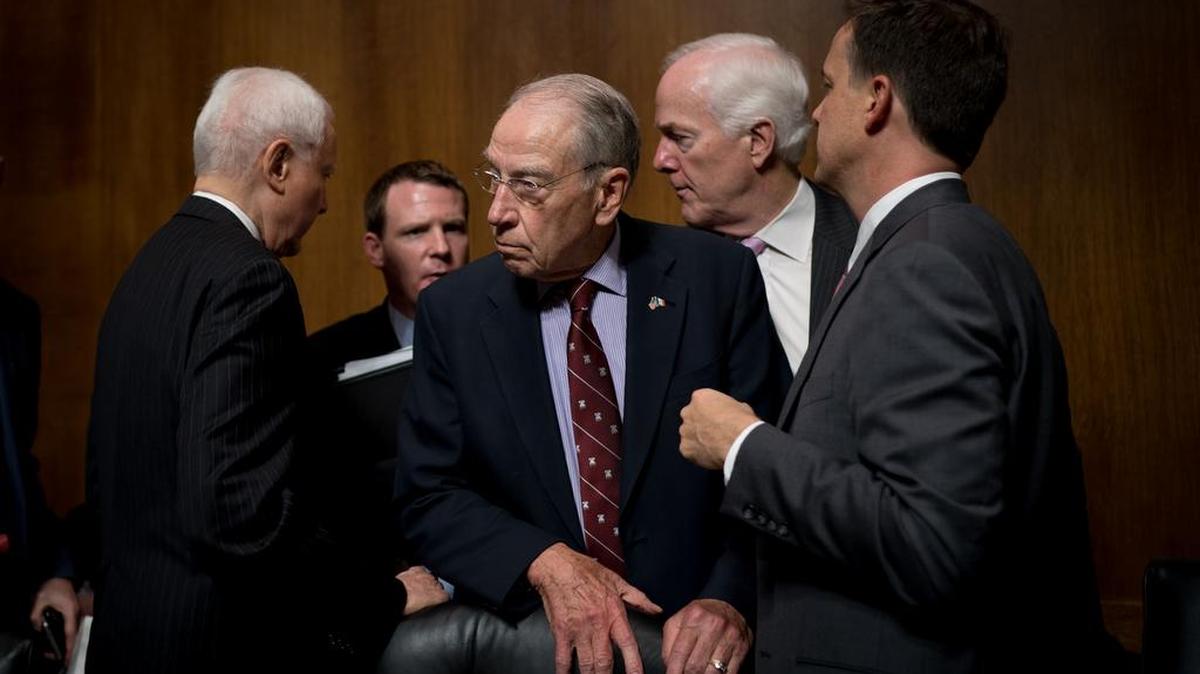 Sen. Chuck Grassley, R-Iowa, stands after he abruptly adjourned the Judiciary Committee meeting where Judge Brett Kavanaugh’s Supreme Court nomination was advanced to the Senate Floor on Friday.
