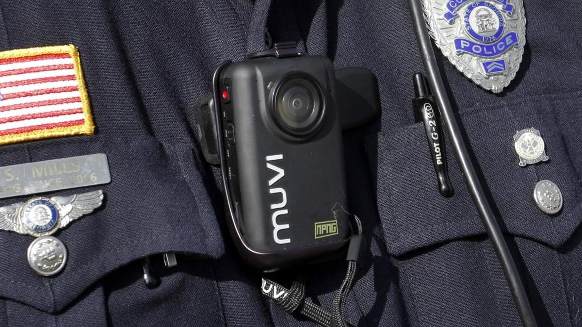 ROBIN TRIMARCHI rtrimarchi@ledger-enquirer.com Cpl. Raymond Mills of the Columbus Police Motor Squad, wears a small body video camera on his uniform.
