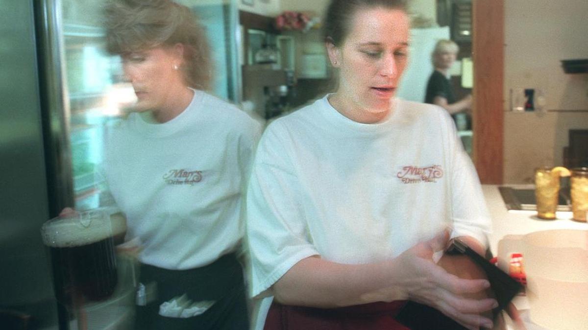The hustle and bustle of the lunch hour keeps Mary’s Drive-In waitresses Dorinda Billoni and Lysa Napiontek frantic to keep up with customers orders. A Sound Off reader says they miss Mary’s and the cold Barq’s they served.