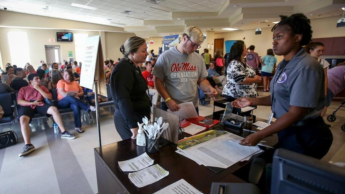 The Department of Public Safety Office Driver’s License Station in Biloxi is crowded as Mississippians wait their turn to be assisted on Tuesday, August 7, 2018. The wait is a combination of more people coming in for services and compliance with the federally mandated Real ID Act.