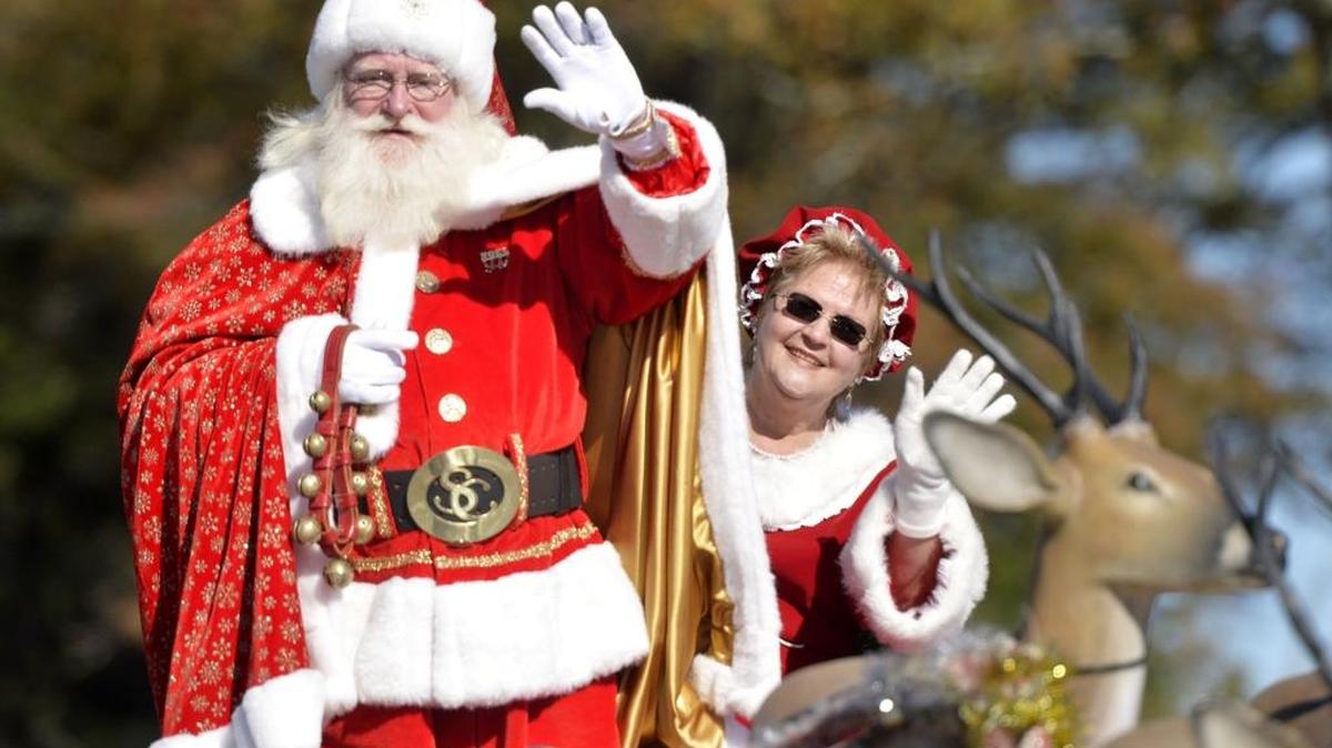 Santa and Mrs. Claus wave at onlookers along S. Davis Drive in Warner Robins during the Robins Regional Christmas Parade in this 2015 Telegraph file photo.