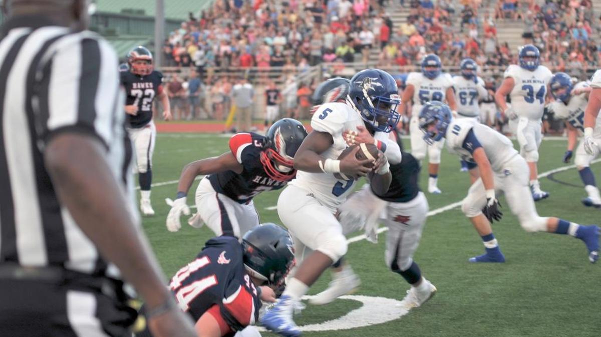 Pearl River Central running back Louis Reece attempts to gain yardage against a stiff Hancock County defense during Friday night's game.