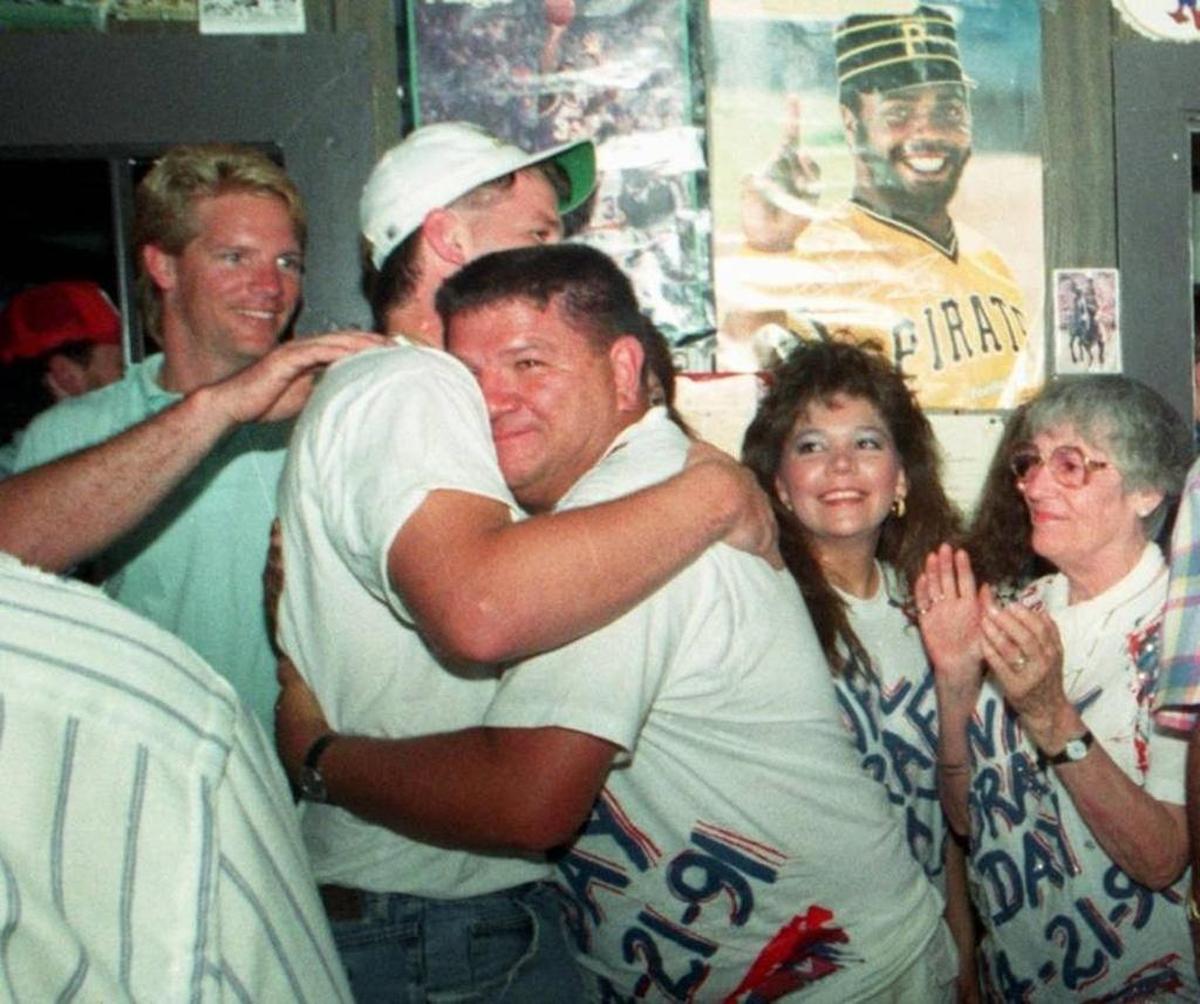 Irvin Favre hugs his son, Brett, after the USM quarterback was chosen by the Atlanta Falcons in the NFL Draft in April 1991.