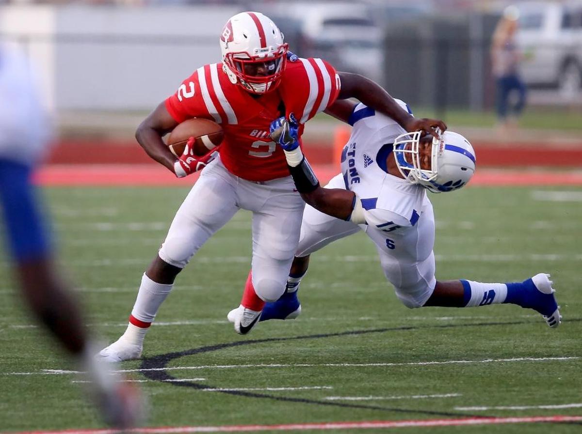 Biloxi quarterback Donte Starks is tackled by Stone County’s Kolby Willis on Sept. 1 at Biloxi High. Photographer’s comments: This is a solid action photo that shows the struggle between the two players.