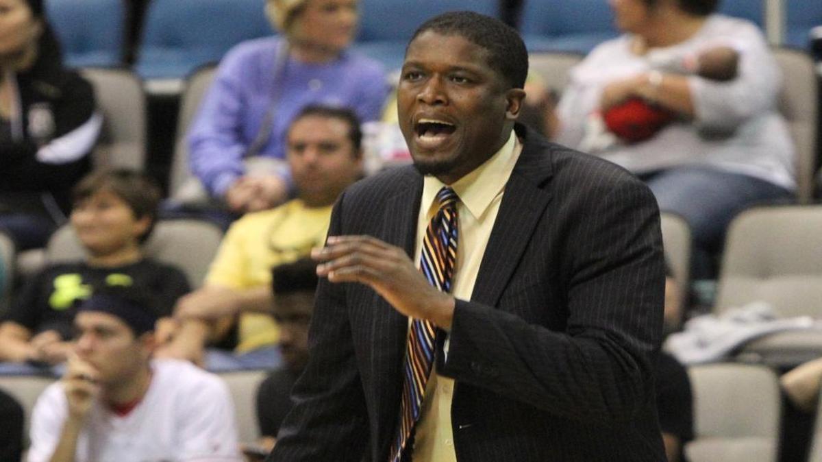 D'Iberville head coach Lorenzo Wright instructs his team during the second quarter of their Hoopsfest game against Pascagoula at the Mississippi Coast Coliseum in Biloxi on Saturday Jan. 30, 2016. Wright is the new Pascagoula head coach.