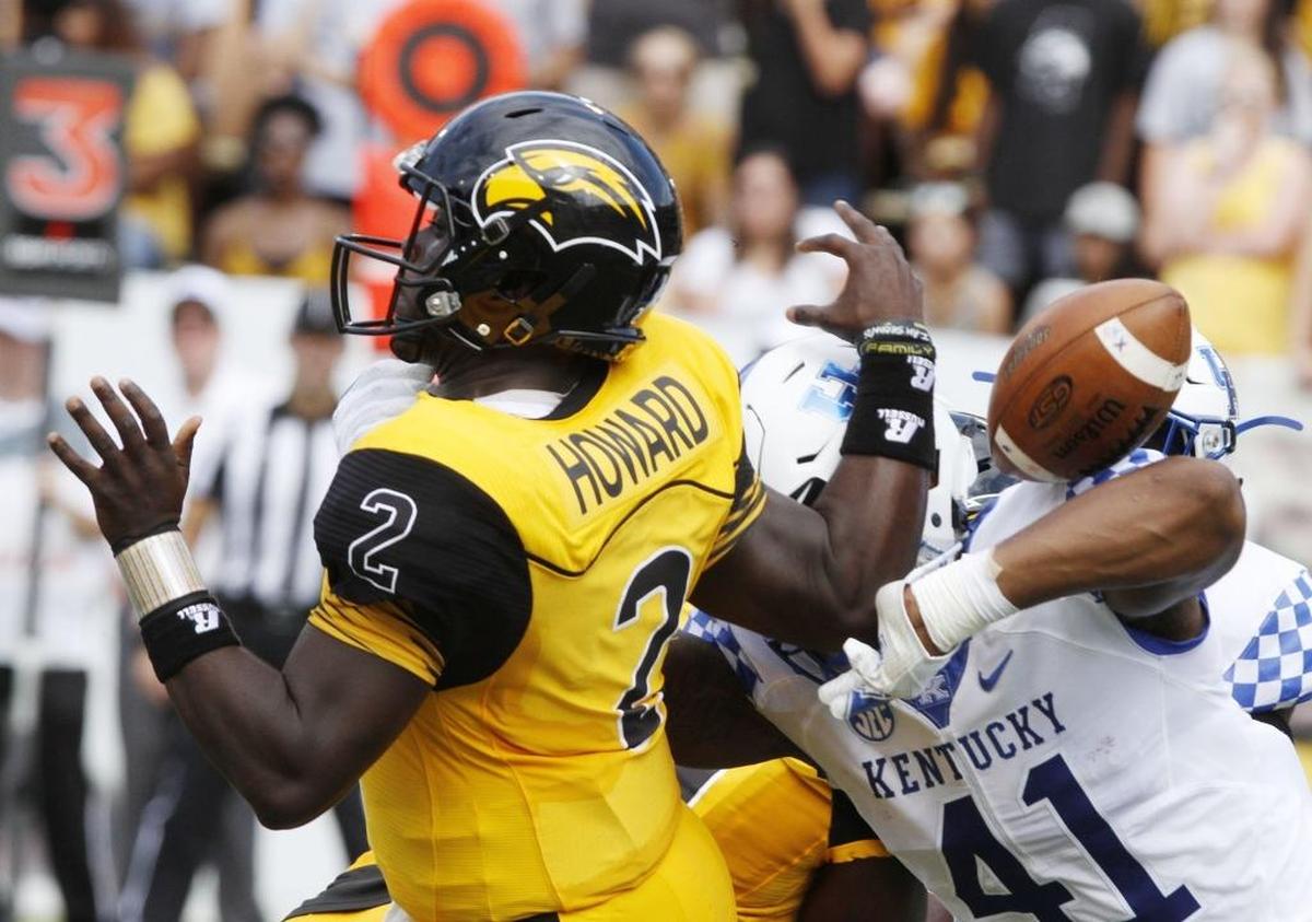 Southern Miss quarterback Keon Howard fumbles as he is hit by Kentucky linebacker Josh Allen during the first quarter of their game at M.M. Roberts Stadium in Hattiesburg on Sept. 2. Photographer’s comment: This is a pretty basic shot, but it told the story of a USM team that was outmanned by Kentucky.