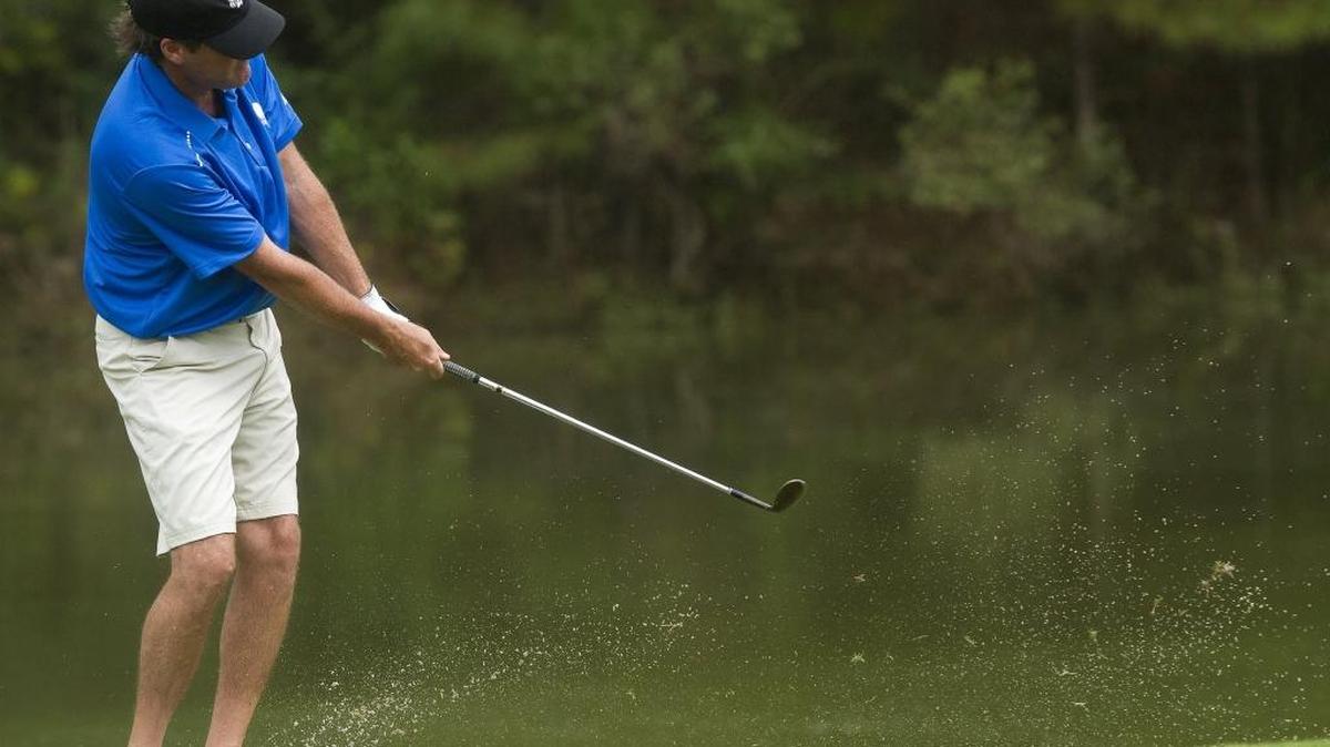 Lane Pippin chips his ball onto the green while competing in the final round of the 40th annual Slavic Invitational on Sunday, September 28, 2014, at Fallen Oak Golf Course. The Slavic Invitational kicks off Friday across the Coast.