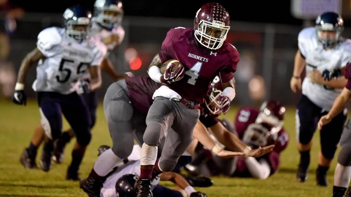 East Central running back Tony Brown (4) runs for a long touchdown against Moss Point on Sept. 29, 2017, at East Central High School in Hurley.