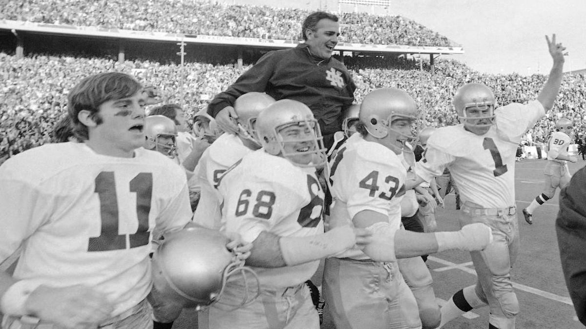 FILE - In this Jan. 1, 1971, file photo, Notre Dame coach Ara Parseghian is carried off the field by his victorious players after the Irish victory over Texas 24-11 in the Cotton Bowl NCAA college football game in Dallas. The Associated Press has been ranking the best teams in college football for the last 80 seasons.