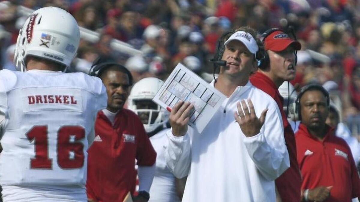 Florida Atlantic head coach Lane Kiffin speaks to his players during the first half of the Conference USA championship against North Texas on Dec. 2 in Boca Raton, Fla.