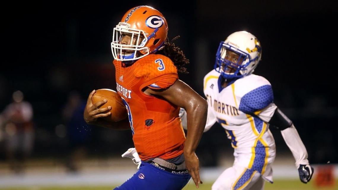 Gulfport quarterback T.Q. Newsome runs the ball against St. Martin on Sept. 22, 2017, at Milner Stadium in Gulfport.
