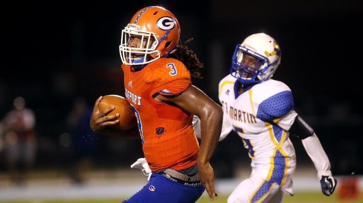 Gulfport quarterback T.Q. Newsome runs the ball against St. Martin on Sept. 22, 2017, at Milner Stadium in Gulfport.