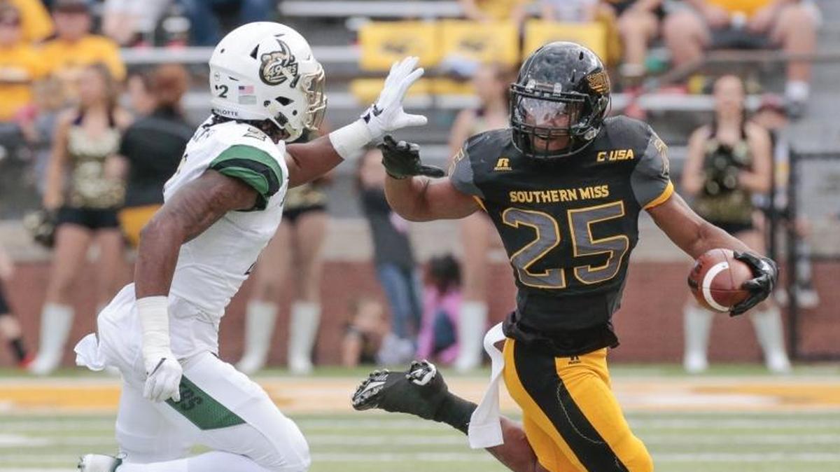 Southern Miss running back Ito Smith avoids a tackle during the game against Charlotte at Roberts Stadium in Hattiesburg on Nov. 18.