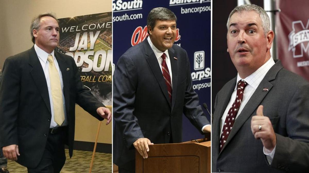 Southern Mississippi football coach Jay Hopson, left, Ole Miss coach Matt Luke and Mississippi State coach Joe Moorhead. All three will take a big chunk out of their respective signing classes on Wednesday, which marks the start of the early signing period.