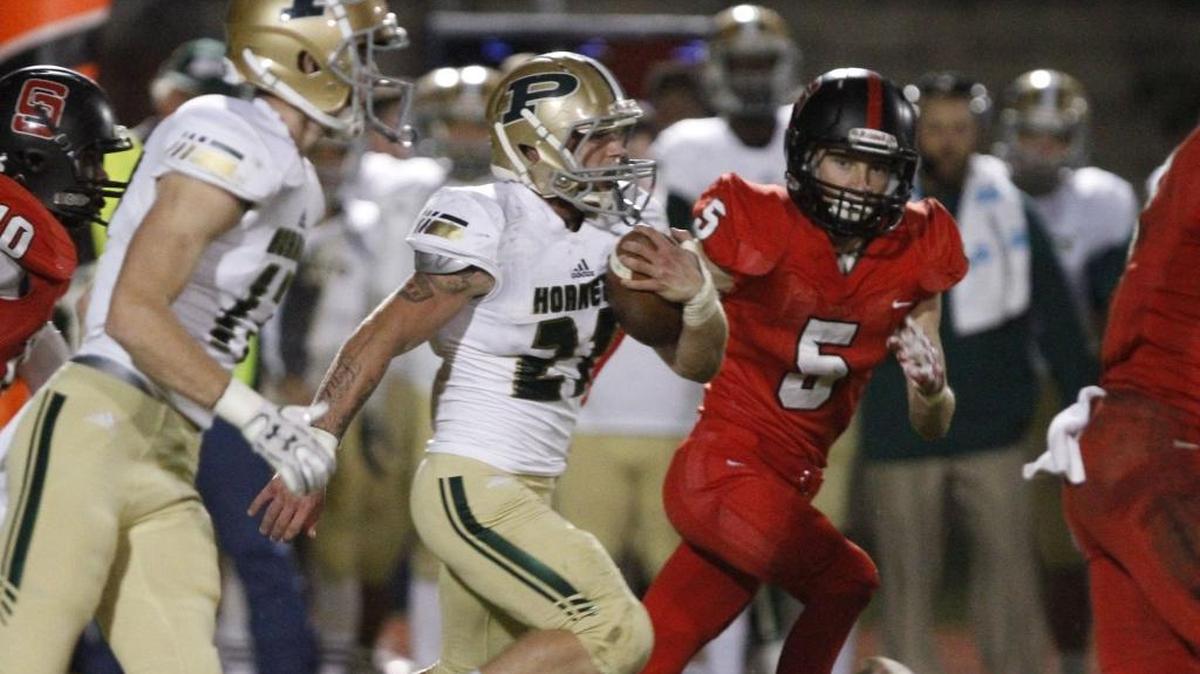 Poplarville running back Cory Knight carries the ball against St. Stanislaus during the second quarter of their 4A playoff game at Brother Martin Stadium in Bay St. Louis on Nov. 10.