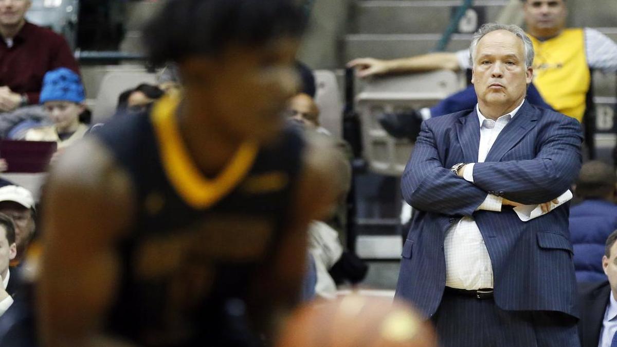 Southern Miss head coach Doc Sadler watches his players against Mississippi State in Jackson on Dec. 19, 2016.