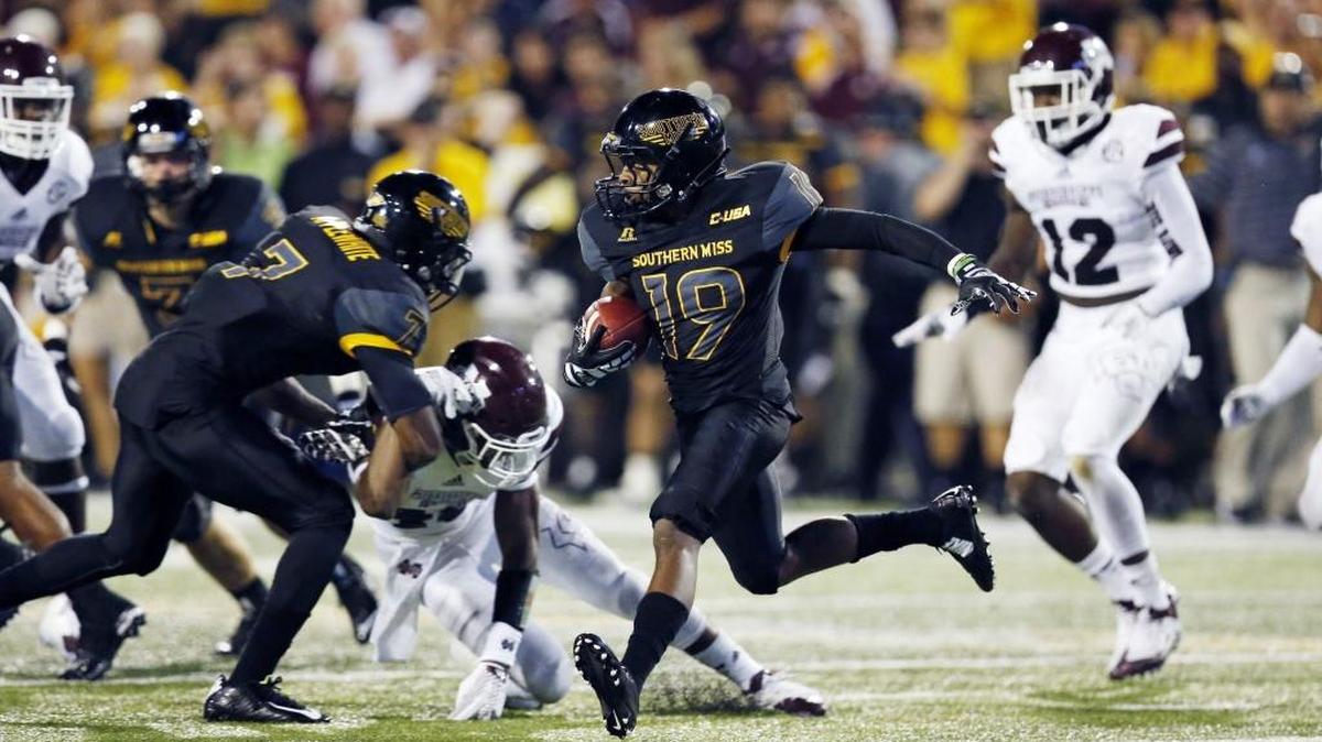 Southern Mississippi kick returner Curtis Mikell (19) brings the ball up field against Mississippi State the on Saturday, Sept. 5, 2015, in Hattiesburg.