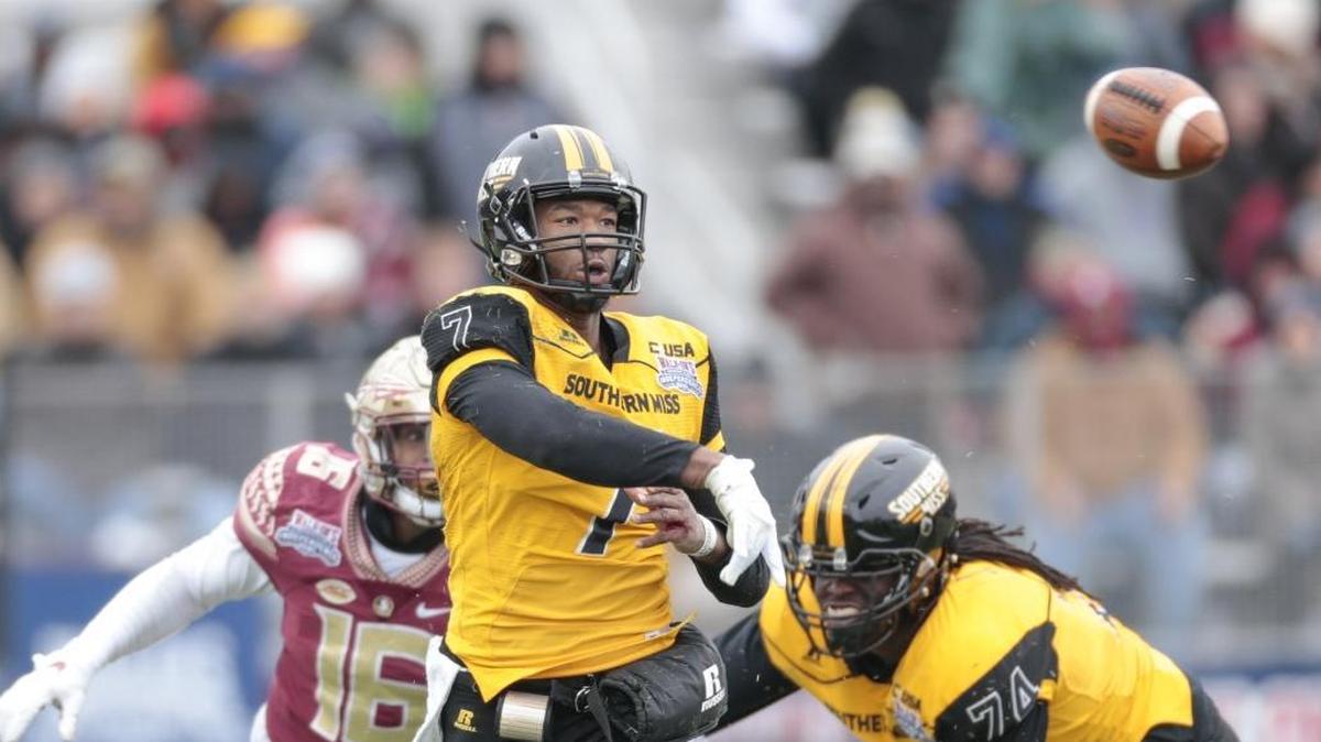 Southern Miss redshirt junior quarterback Kwadra Griggs tosses a short pass during the Independence Bowl against Florida State University on Dec. 27, 2017.