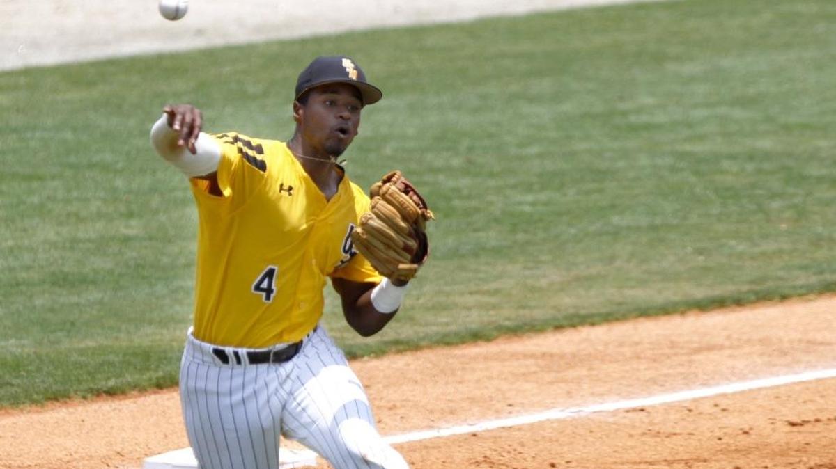 Southern Miss third baseman Tracy Hadley, a former Pascagoula star, throws to first after fielding a ground ball against Charlotte on Saturday at MGM Park in Biloxi.