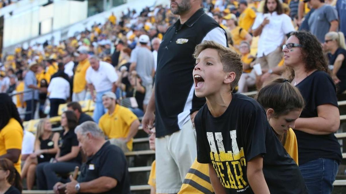 Southern Miss fan Ben Soule, 11, of Greene County yells at the referees during the fourth quarter of their game against Kentucky at M.M. Roberts Stadium in Hattiesburg on Saturday.